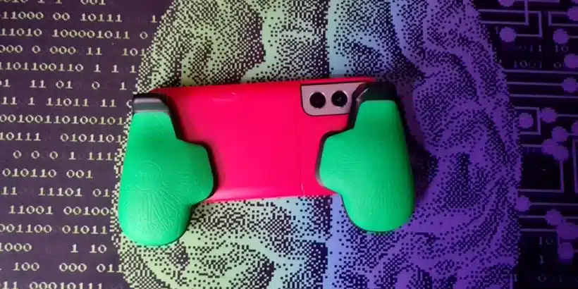 PuK Modular Gaming Hardware: Cách mạng mới cho điều khiển game trên điện thoại 3 gamen.vn puk modular gaming hardware android ios green puk grips attached to phone in pink case 1 jpg 820